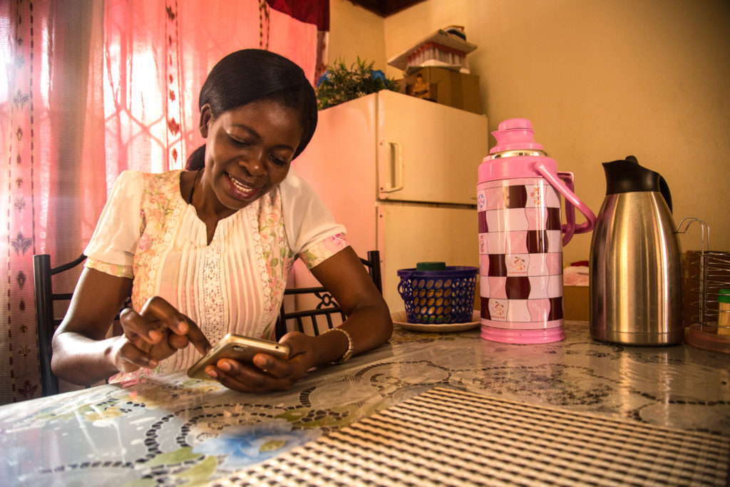 A Kiteka female entrepreneur is given essential smartphone skills to improve her business operations. 